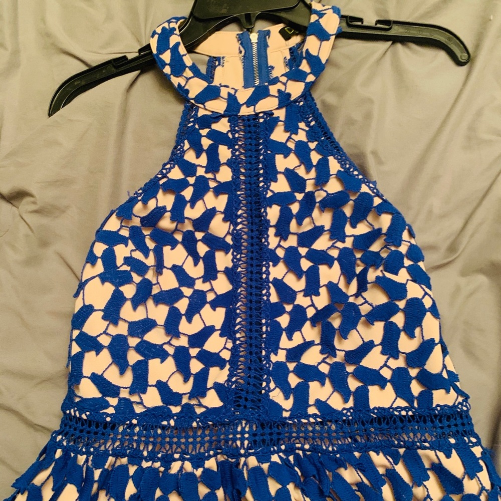 Tan dress with a blue crotchet pattern on top